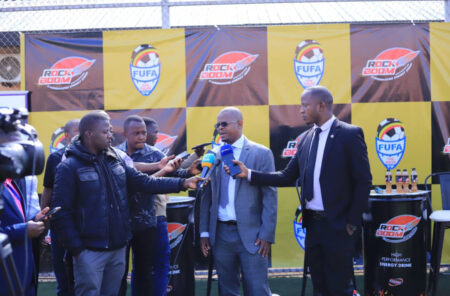 FUFA President Hon. Eng. Moses Magogo Hassim speaking to the media after the partnership announcement. 